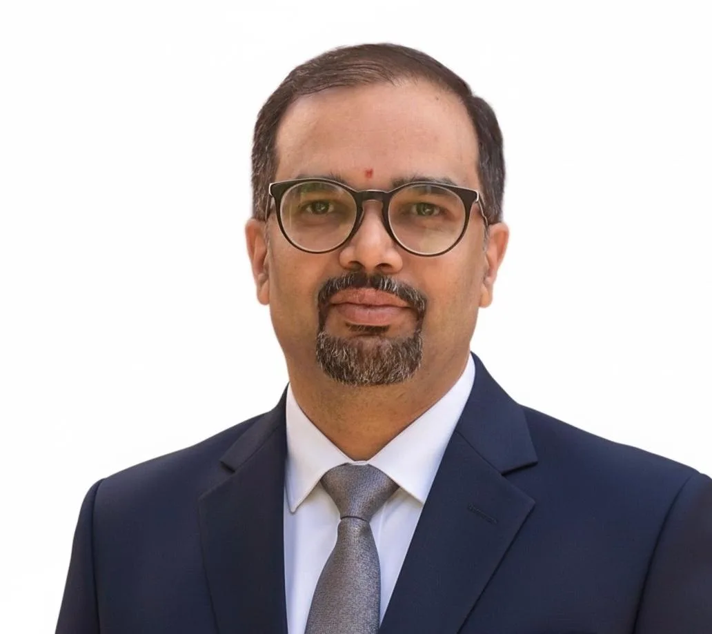 Dr. Krishna Raj